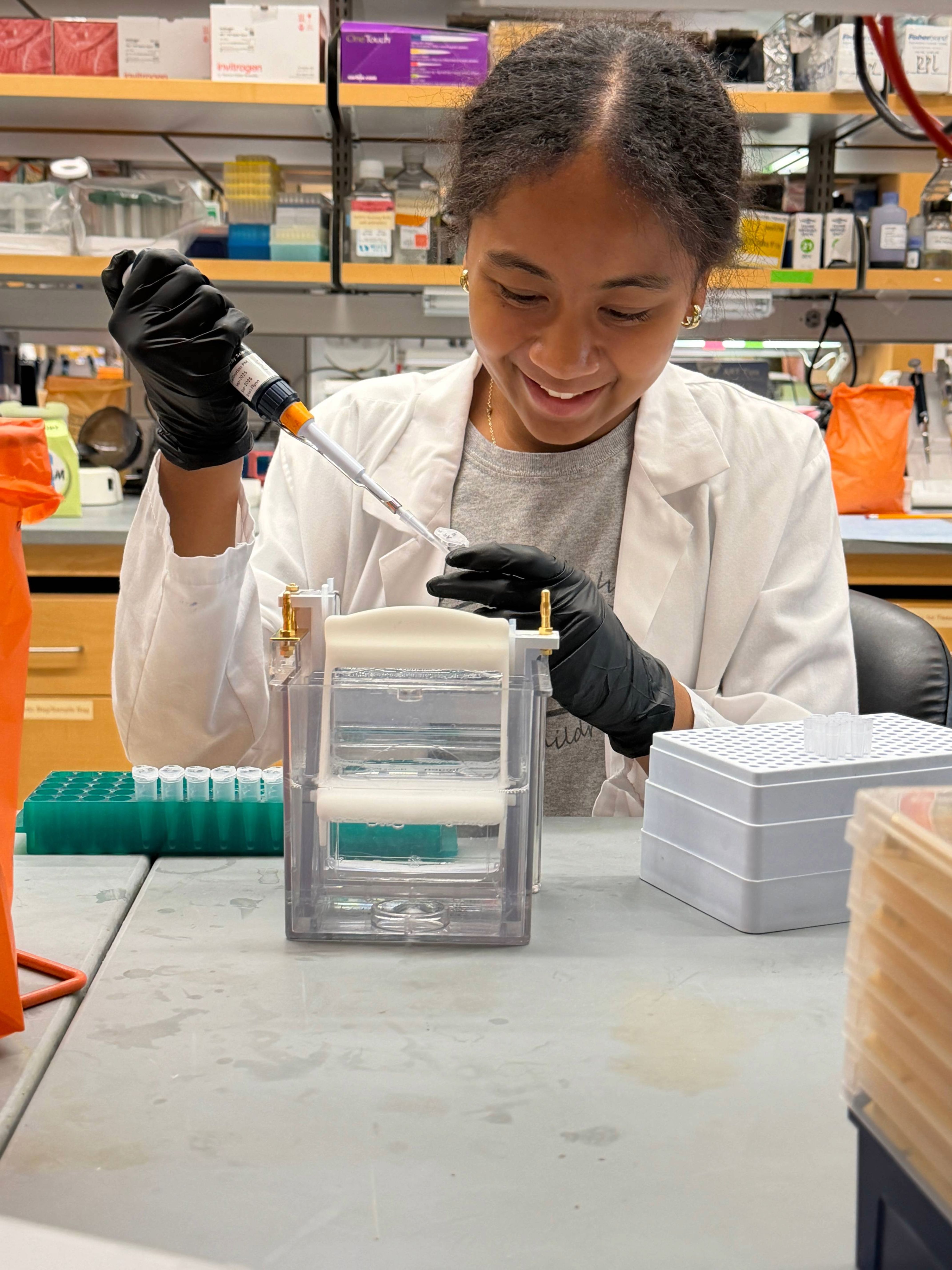 Sarah Xavier conducting an experiment