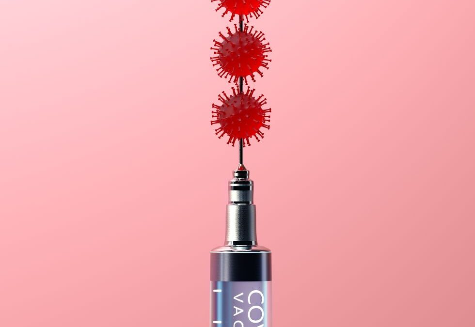 covid-19-cells-on-syringes-needle-royalty-free-image-1612824466_